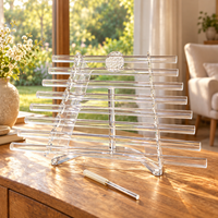 Flower of Life clear crystal harp beside a garden window