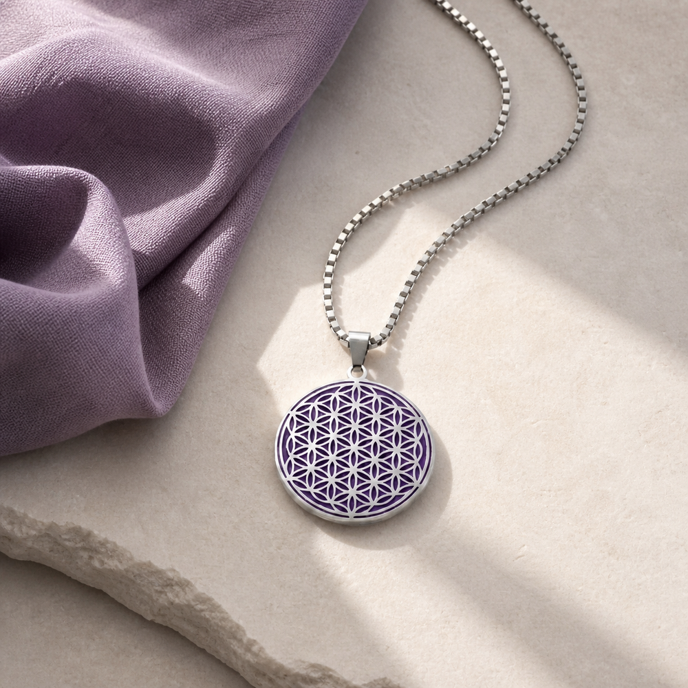 Purple and silver Flower of Life charm necklace on stone and plum linen