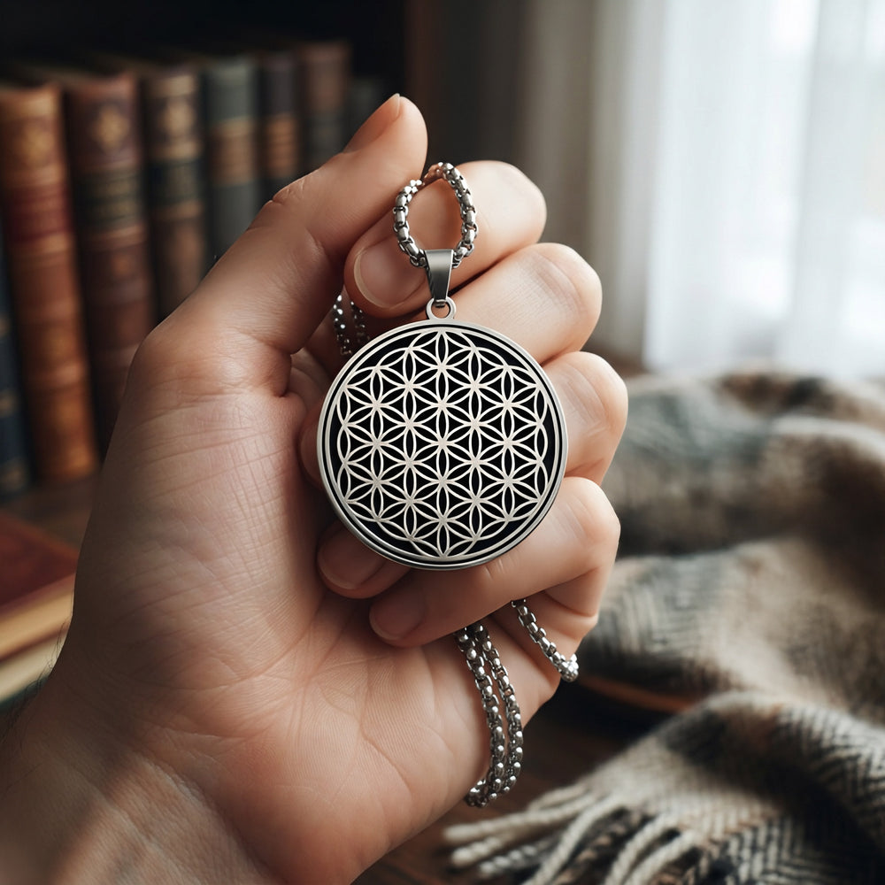 Black and silver Flower of Life charm necklace detail