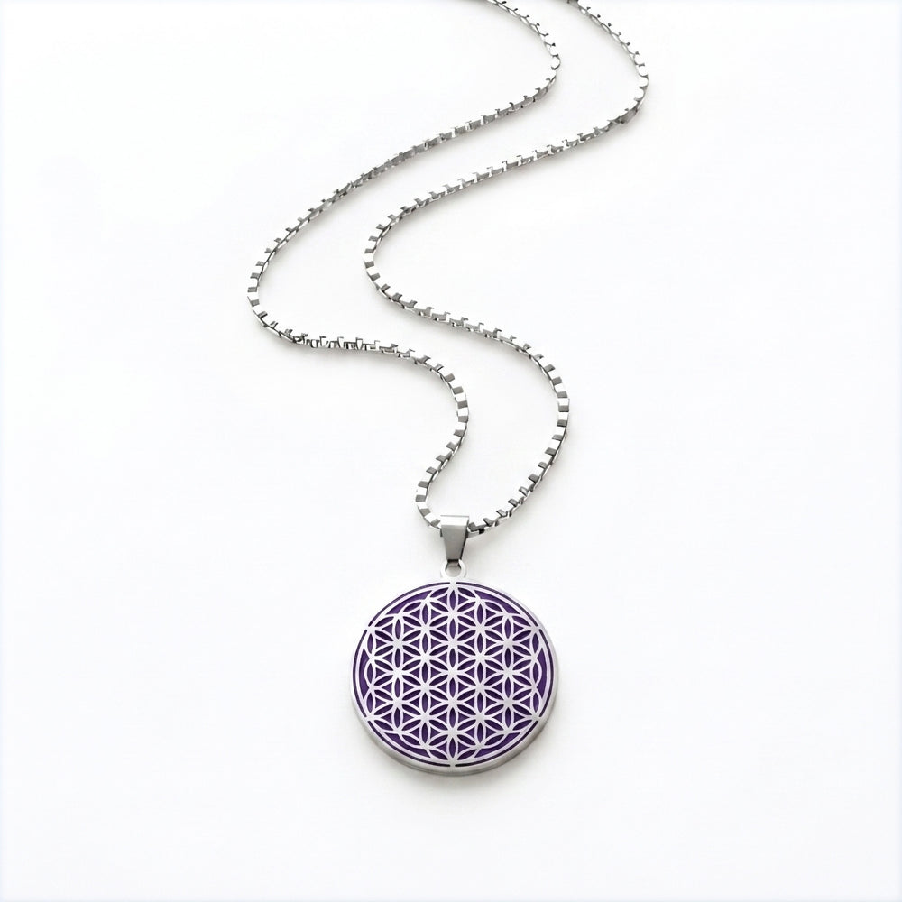 Purple and silver Flower of Life stainless steel charm necklace on a white background