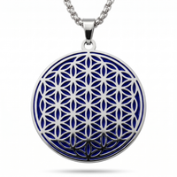 Indigo and silver Flower of Life stainless steel charm necklace on a white background