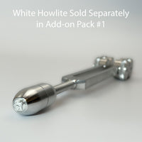 A close-up view of a silver-colored metal object, possibly a tool or device, with a text overlay that reads "White Howlite Sold Separately in Add-on Pack #1".