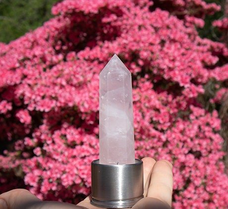 https://myriadmelodies.com/cdn/shop/products/joy-crystal-infused-borosilicate-glass-water-bottle-healing-rose-quartz-and-amethyst-wand-point-inserts-with-bamboo-lid-and-base-419461_500x.jpg?v=1668685445